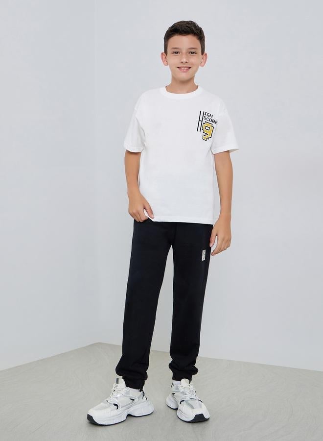 ستايلي تيشيرت واسع بطبعة جرافيك وأكمام قصيرة - Image 2